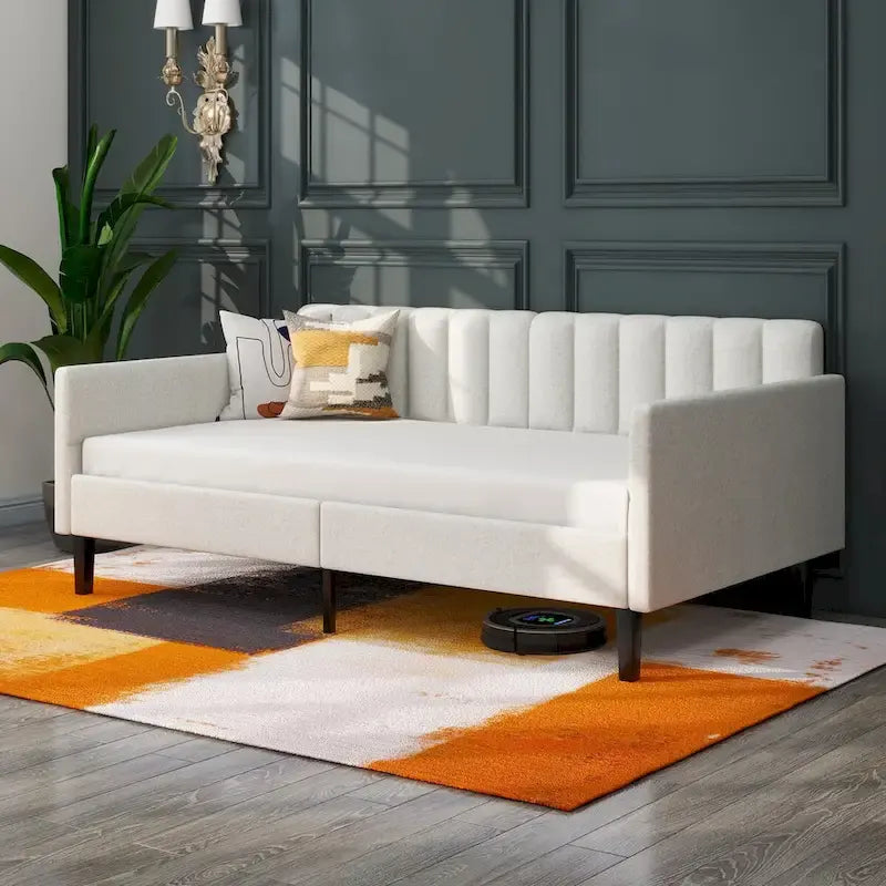 Divano letto singolo imbottito in boucle color avorio con schienale trapuntato a coste