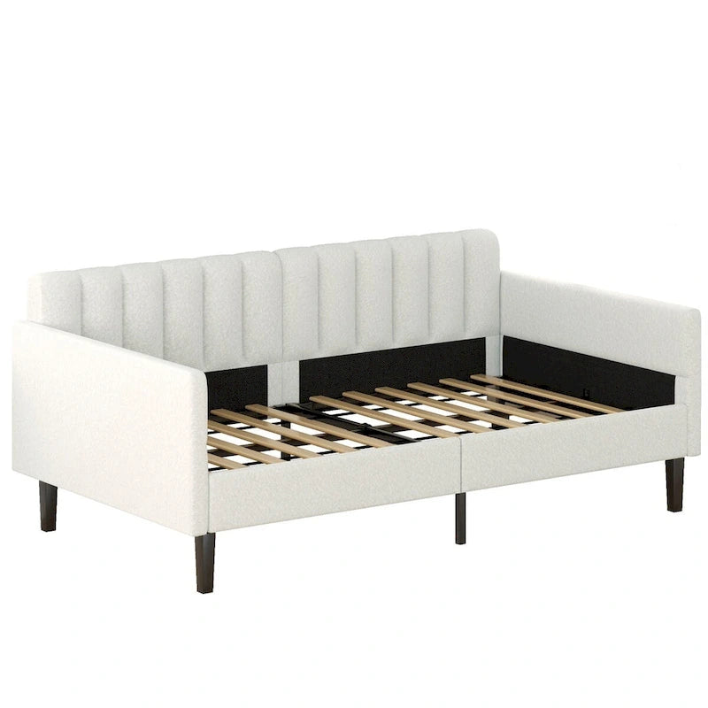 Divano letto singolo imbottito in boucle color avorio con schienale trapuntato a coste